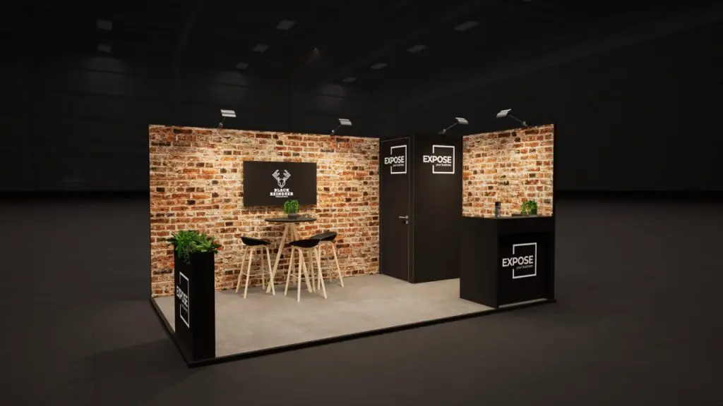 Beursstand met bakstenen beurswanden, balie, presentatiescherm en zitgedeelte voor een sfeervolle en professionele beurs-presentatie.
