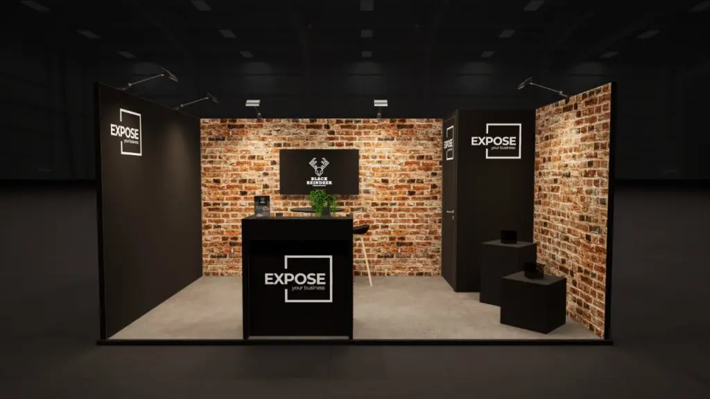 Beursstand met bakstenen beurswanden, balie, presentatiescherm en zitgedeelte voor een sfeervolle en professionele beurs-presentatie.